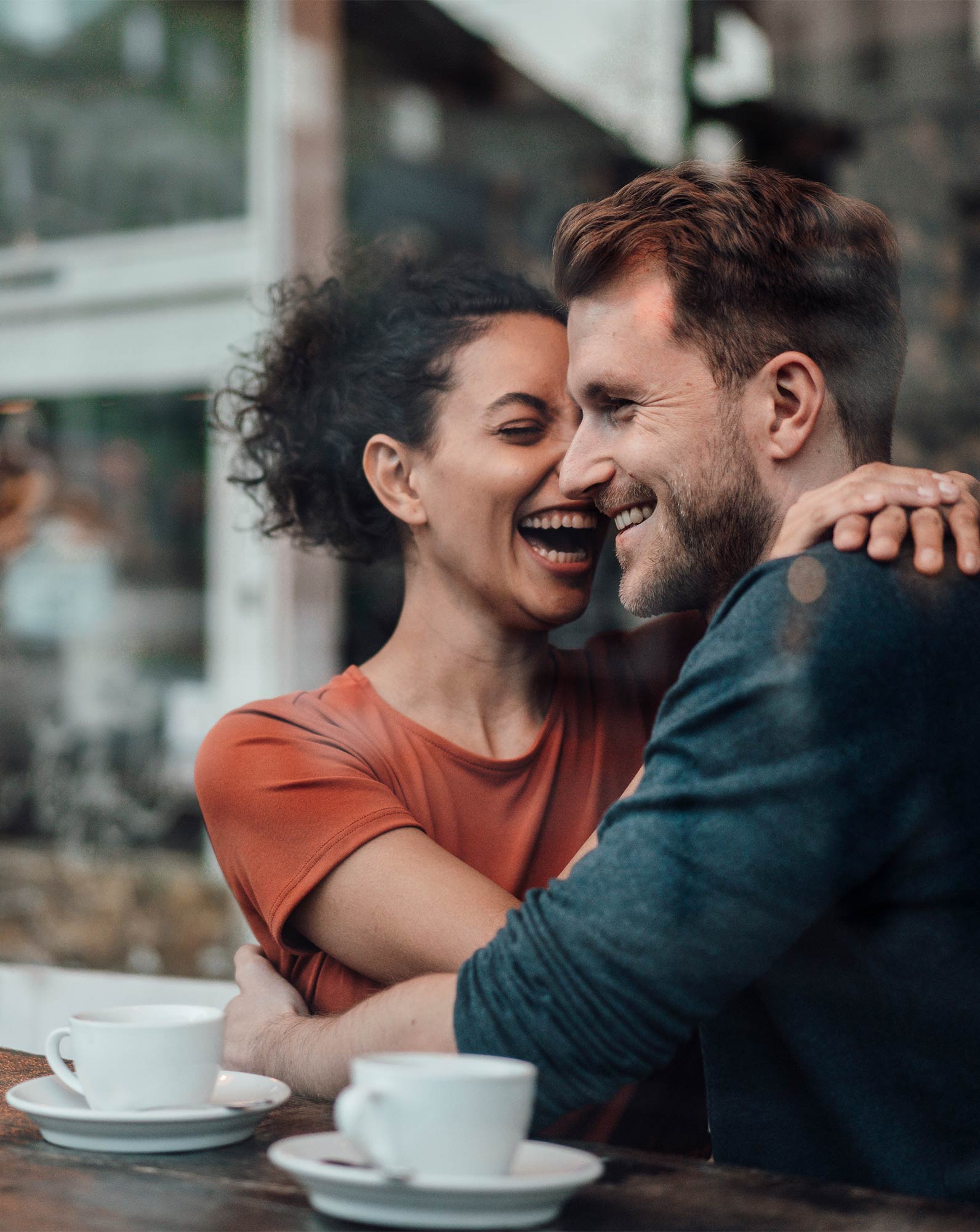 Couple Hugging in Window